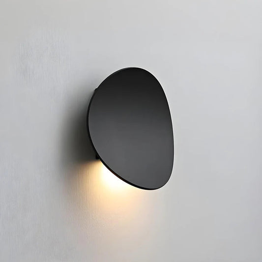 Modern Minimalist Wall Lamp with Organic Disc Shape and Warm LED Glow