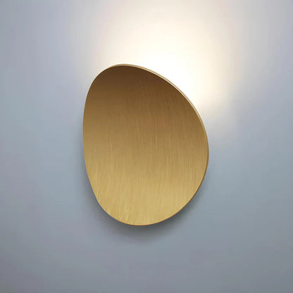Modern Minimalist Wall Lamp with Organic Disc Shape and Warm LED Glow