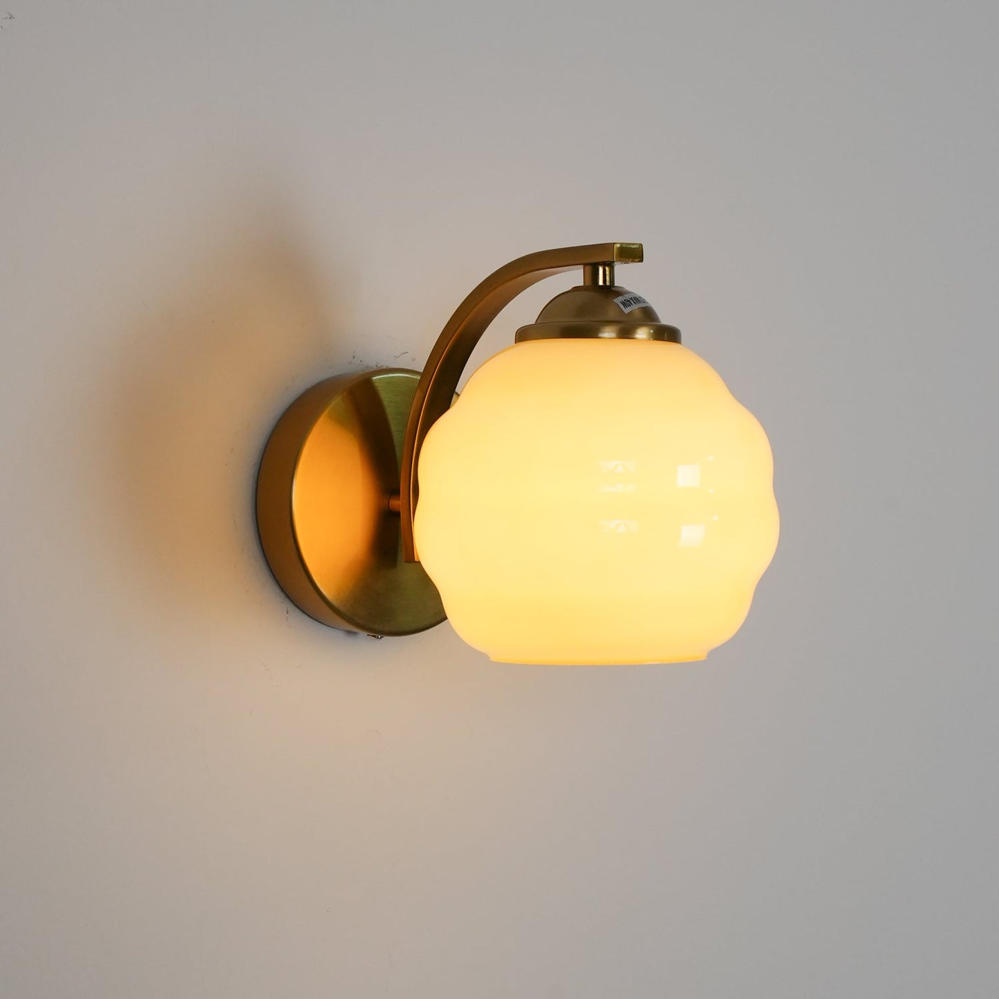 Wall Lamp Art Deco with Curved Glass Shade and Brass or Chrome Finish